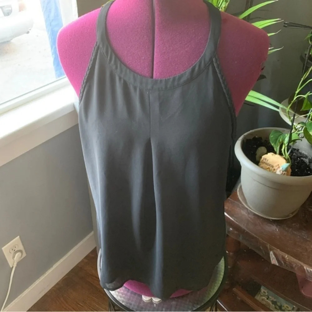 Black silk crepe-like high neck strapless top with button back
